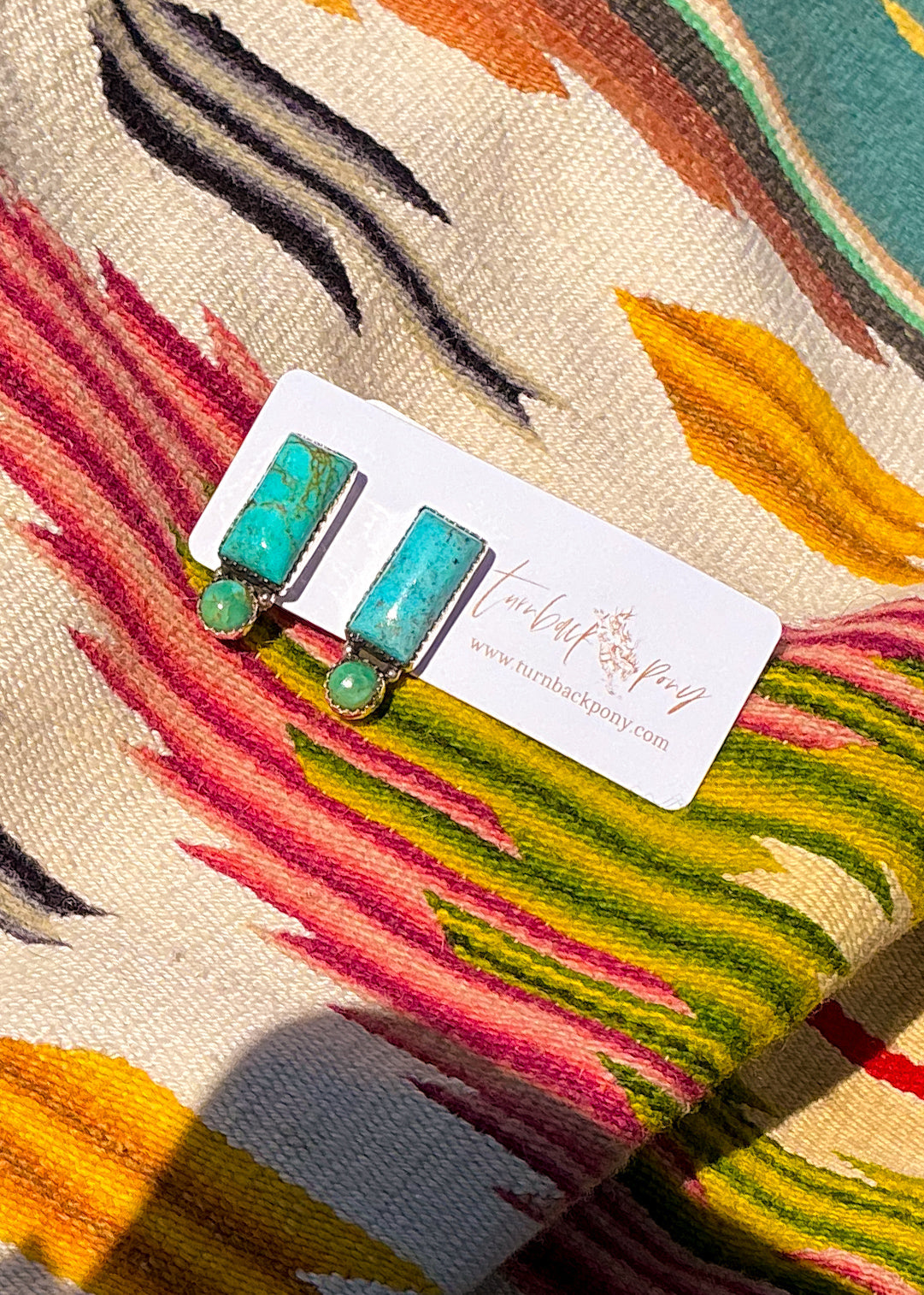Raya Studs - Turnback Pony ™ - Earrings
